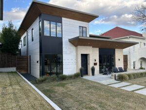 custom 2 story home with swisspearl carat in white